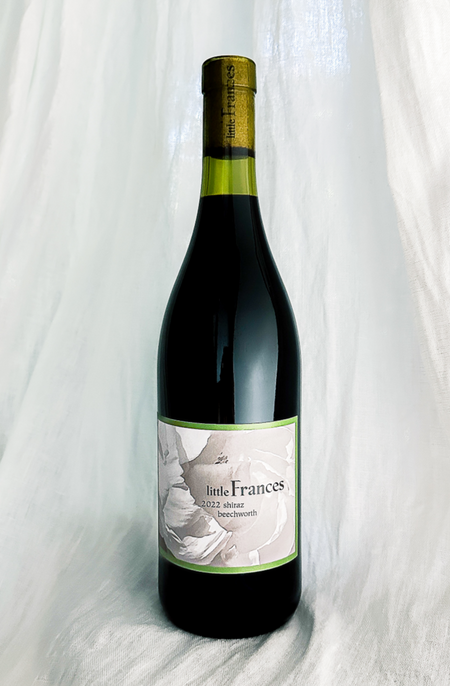 Bottle of the award winning Little Frances 2022 Shiraz from Beechworth - grown from the fertile soils of Warner Vineyard.  Picked and fermented to express the blue fruit and cold stone elements of cool-climate shiraz. Aged in almost all French barrique plus one Appalachian hogshead. A juicy take on one of Beechworth's most lauded sites